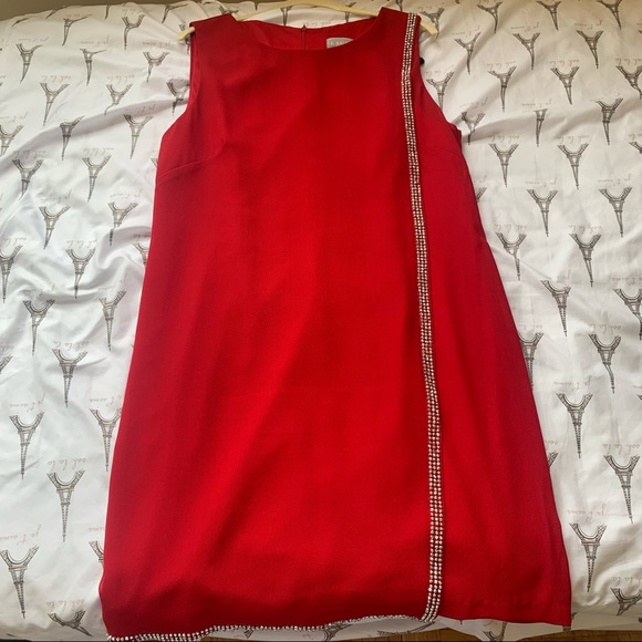 Sleeveless Dress with Embellished Wrap Hem Detail - Picture 1 of 10